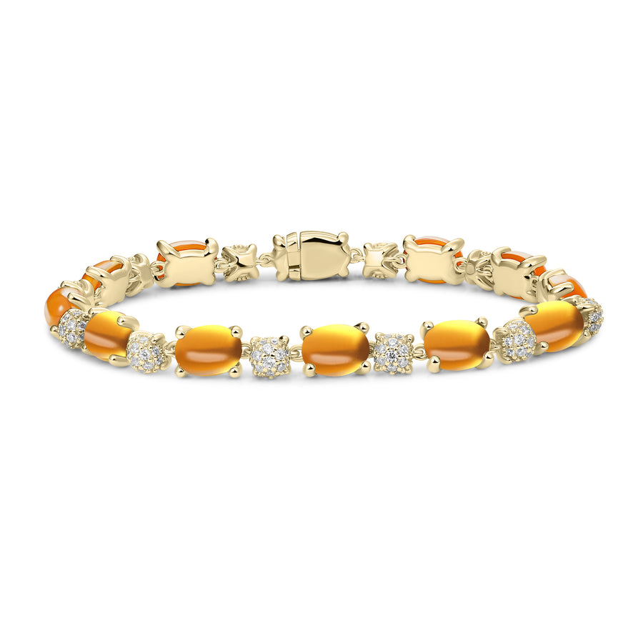 925 Sterling Silver. Yellow Gold Plated Silver. Sterling silver bracelet, featuring smooth polished stones.